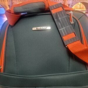 Vibrant Green and Orange Travel Bags for Adventurers